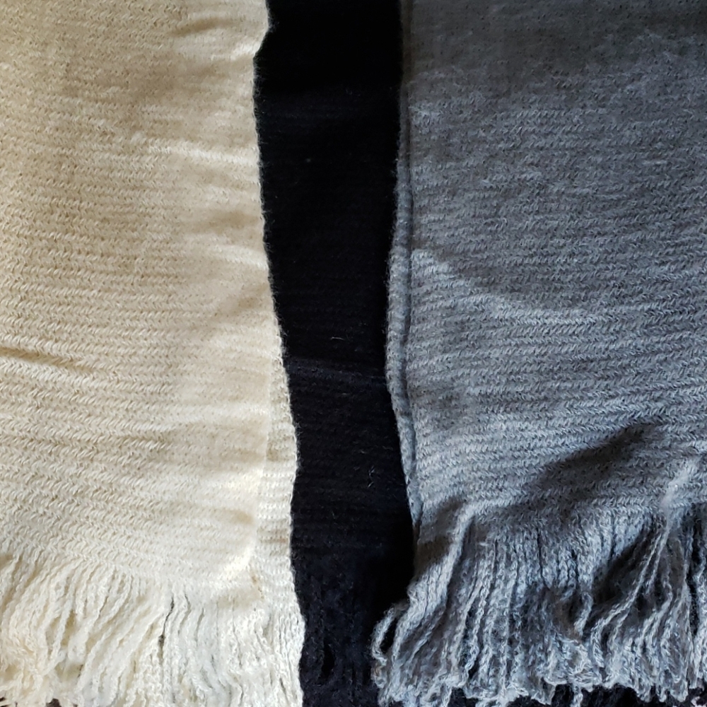 3/$20.     Never used scarf with fringe